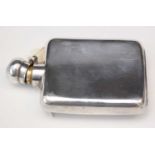 Silver hip flask.