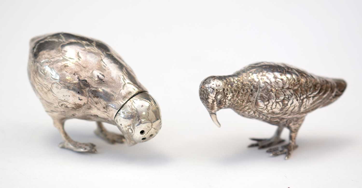 German silver 800 pepperette; and a silver bird ornament.