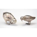 German silver 800 pepperette; and a silver bird ornament.