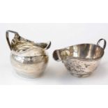 George III silver jug; and a silver sauce boat.