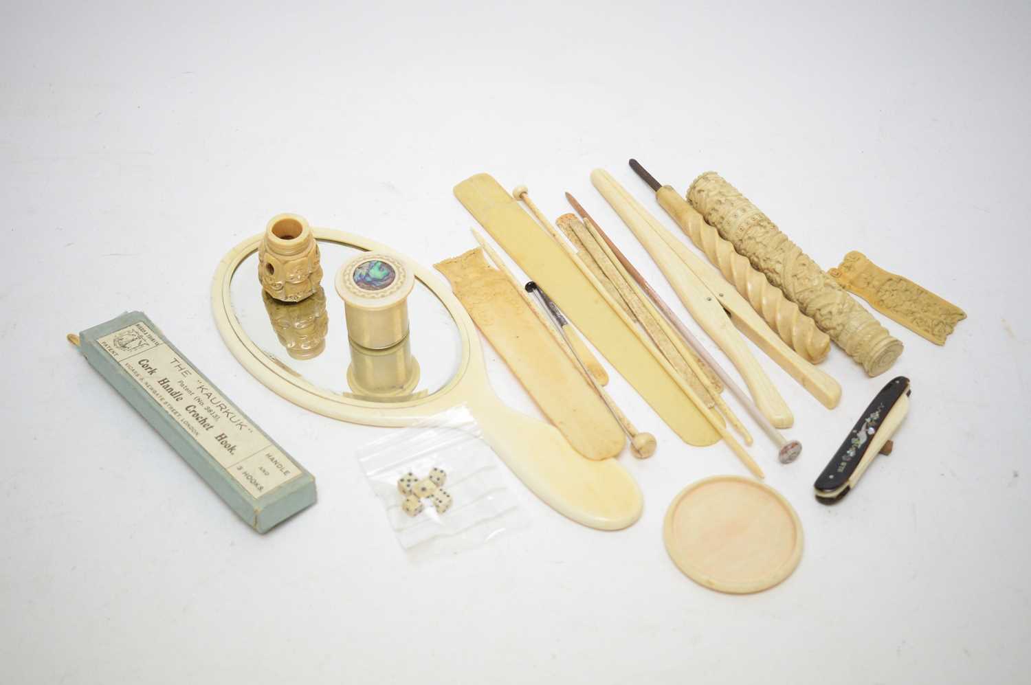 A quantity of ivory and bone items.