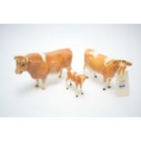Beswick Guernsey Bull, Cow and Calf.