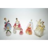 Nine Royal Doulton figurines.