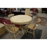 20th Century pine breakfast table and four chairs,