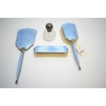 Silver guilloche enamel back dressing table set; and a scent bottle.