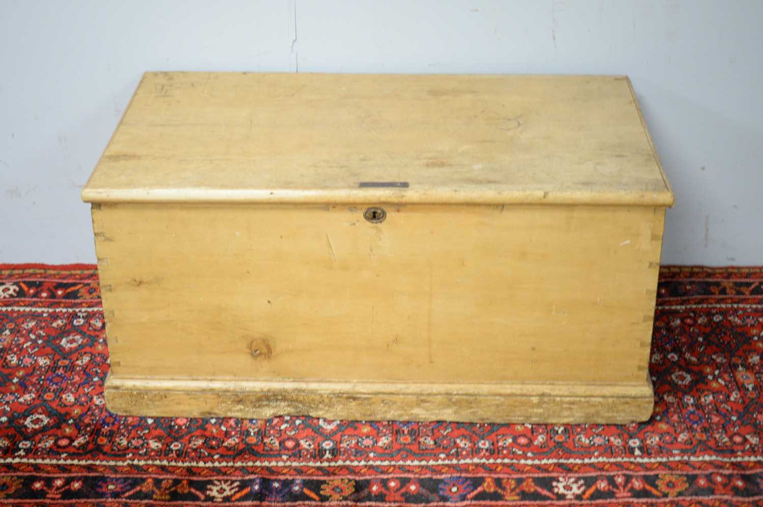 A 20th C stripped pine blanket box.