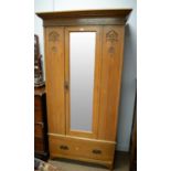 Art Nouveau style walnut single door wardrobe.