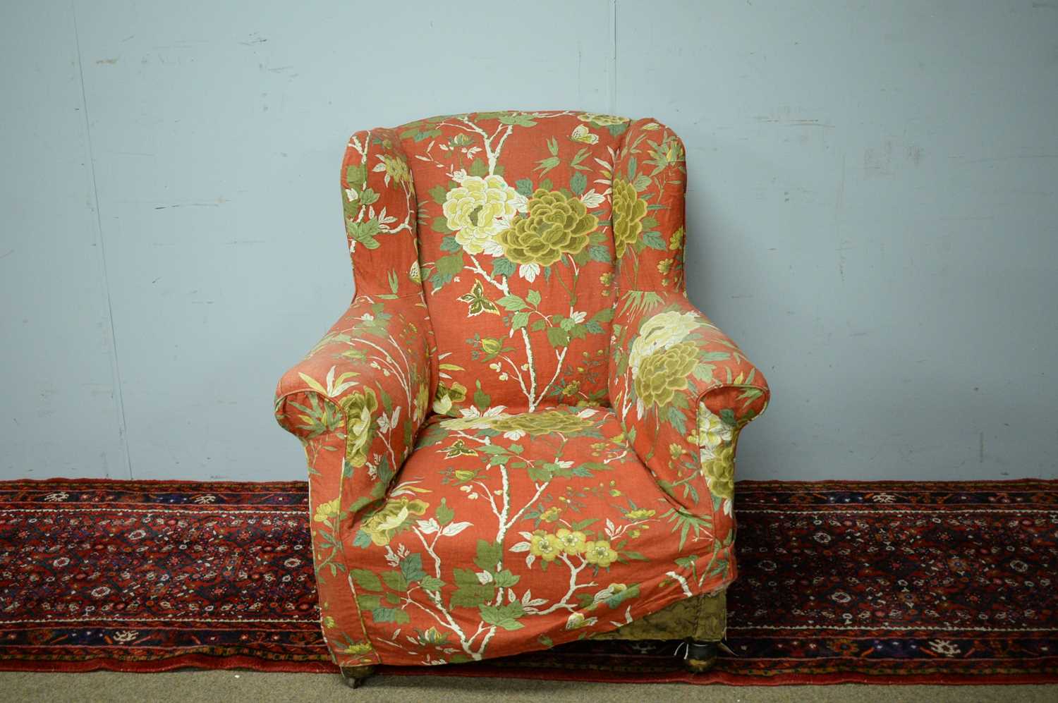 Early 20th C wing back armchair.