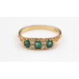 Emerald and diamond ring.