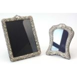 Two silver-mounted photograph frames.