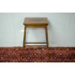 An Edwardian mahogany card table