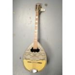 Ecorda bouzouki with eight strings.