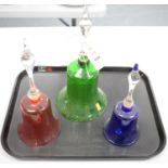 Three coloured and clear glass bells