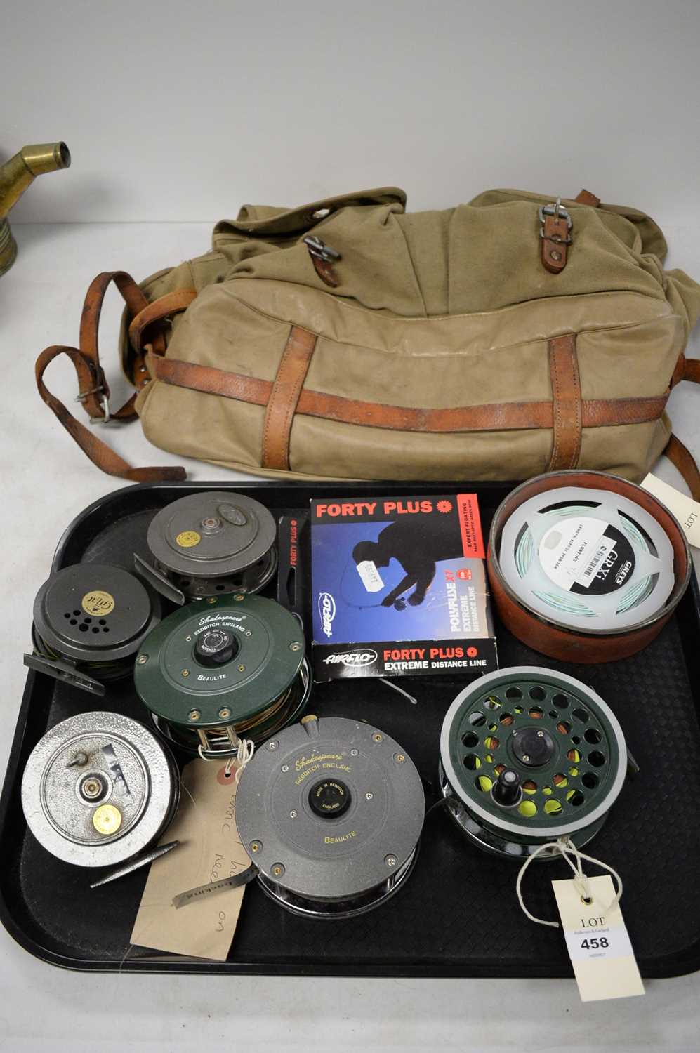 Selection of fishing reels; and fishing bag with priest.