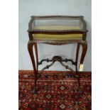 A 20th Century mahogany bijouterie table