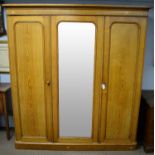 Early 20th Century oak three door wardrobe