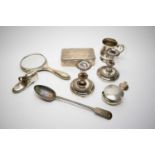 A selection of small silver items, including: a shoe pattern money box; a cigarette box; a