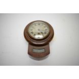 Early 20th C mahogany miniature wall clock.