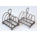 Pair of silver five bar toast racks.