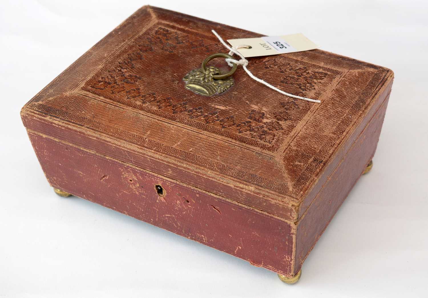 Victorian and embossed leather sarcophagus jewellery box.