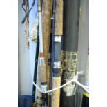 A bundle of five modern fishing rods with slips and one tube, various.
