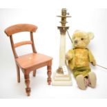 Early 20th C table lamp; and a plush 20th C teddy bear.