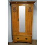 Art Nouveau style walnut wardrobe.