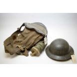 WWII baby's gas mask; and a WWII Brodie-type helmet.