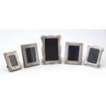 Selection of silver-mounted photograph frames.