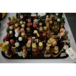 A large quantity of miniature Whiskey and other items