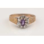 Amethyst and diamond cluster ring.