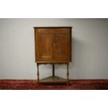 19th Century oak corner cabinet.