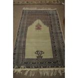 20th C Turkoman prayer rug.