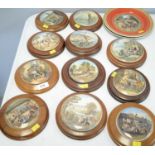Collection of eleven Prattware pot lids.
