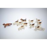 Beswick Fox, Beagle and nine Hounds.