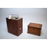 Oak sewing box and an Esso red painted tin petrol can.