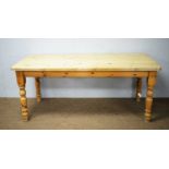 A 20th Century pine kitchen table