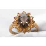 A smokey quartz and citrine cluster ring.