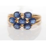 Seven-stone Kanchanaburi sapphire cluster ring.