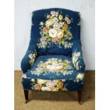 An Edwardian easy armchair