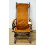 An early 20th Century oak rocking chair