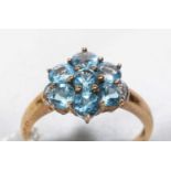 A blue topaz cluster ring.