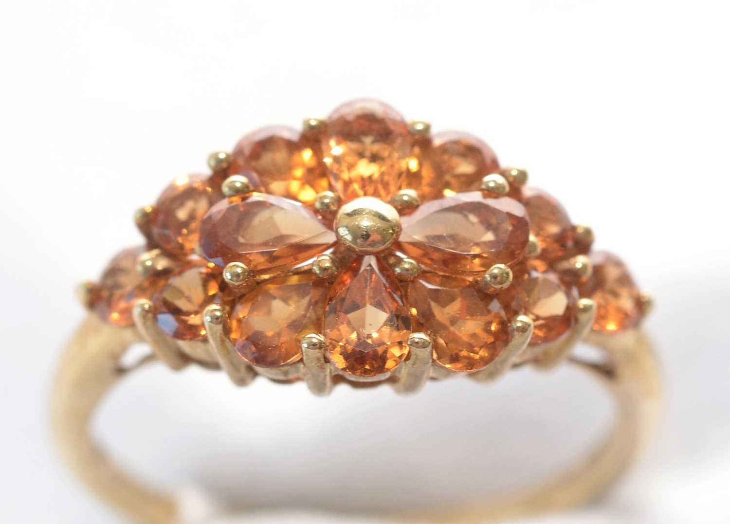 A Spessartite garnet cluster ring.