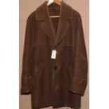 A gentleman's brown sheepskin coat.