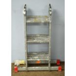 A set of folding ladders.