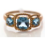 A London blue topaz three-stone ring.