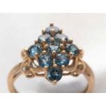 A London blue topaz cluster ring.