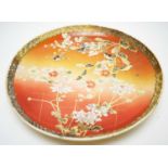 A large Japanese wall plaque