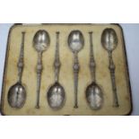 A set of six silver coronation Anointing spoon patterned teaspoons,