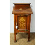 An early 20th Century Arts & Crafts bedside cabinet